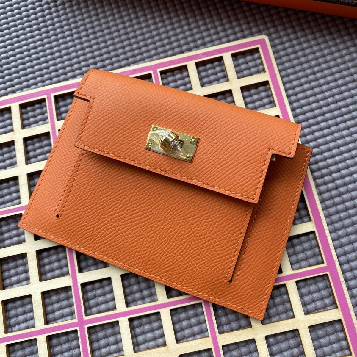Hermes Kelly Pocket 13.5 Orange Epsom Ghw